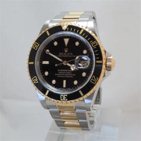 rolex submariner nero e oro prezzo